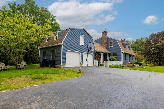 850 Black Plain Rd, North Smithfield, RI 02896 - dutch colonial with a gambrel roof, driveway, a front yard, and a garage