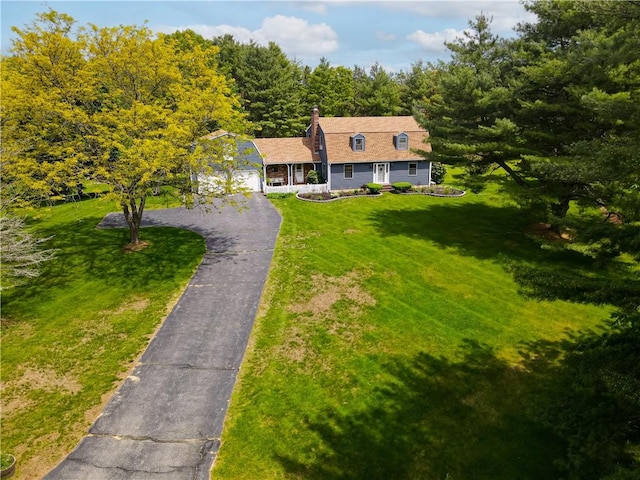 850 Black Plain Rd, North Smithfield, RI 02896 - view of front of house featuring driveway, a front yard, a chimney, a gambrel roof, and a porch