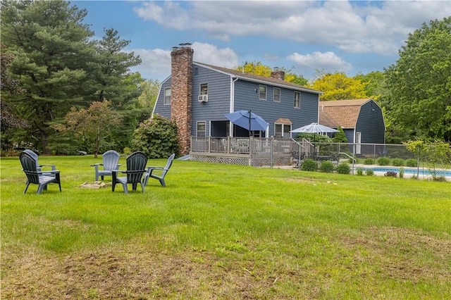 850 Black Plain Rd, North Smithfield, RI 02896 - rear view of property featuring a chimney, a deck, and a yard