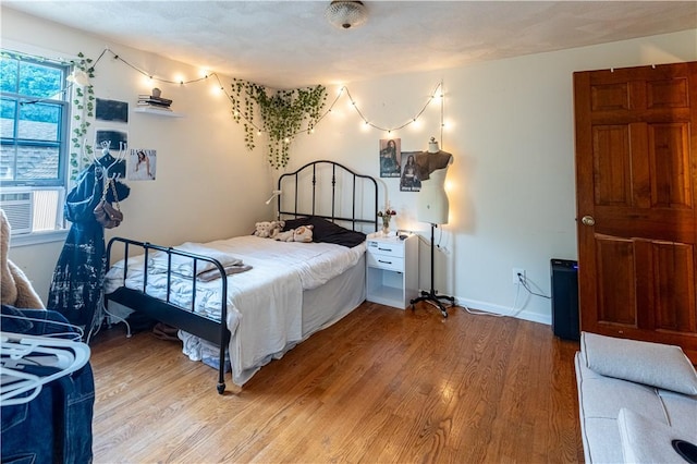 850 Black Plain Rd, North Smithfield, RI 02896 - bedroom featuring wood finished floors and baseboards