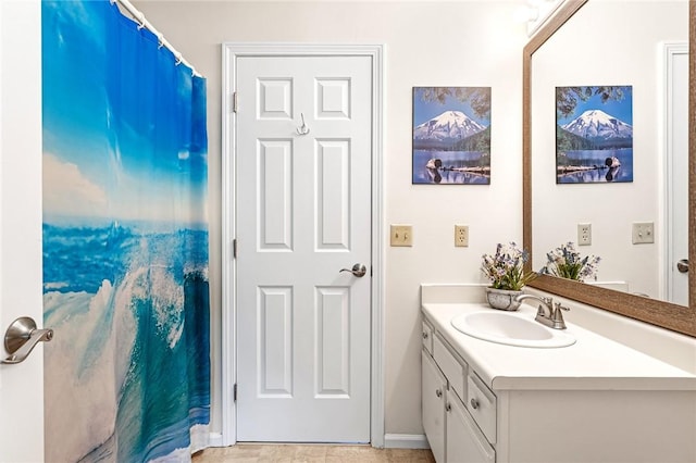 565 Quaker Ln Unit 43, West Warwick, RI 02893 - bathroom with vanity and a shower with shower curtain