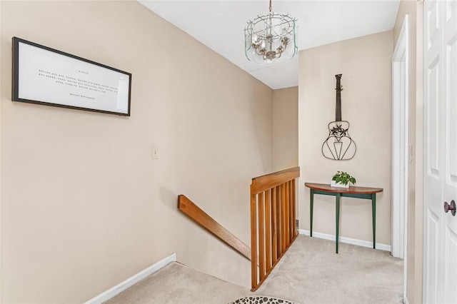 565 Quaker Ln Unit 43, West Warwick, RI 02893 - stairway with carpet floors, baseboards, and a chandelier