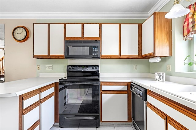 565 Quaker Ln Unit 43, West Warwick, RI 02893 - kitchen featuring black appliances, crown molding, light countertops, white cabinets, and light tile patterned flooring
