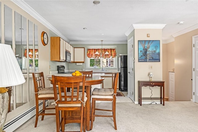 565 Quaker Ln Unit 43, West Warwick, RI 02893 - dining space with baseboard heating, a chandelier, crown molding, light colored carpet, and baseboards