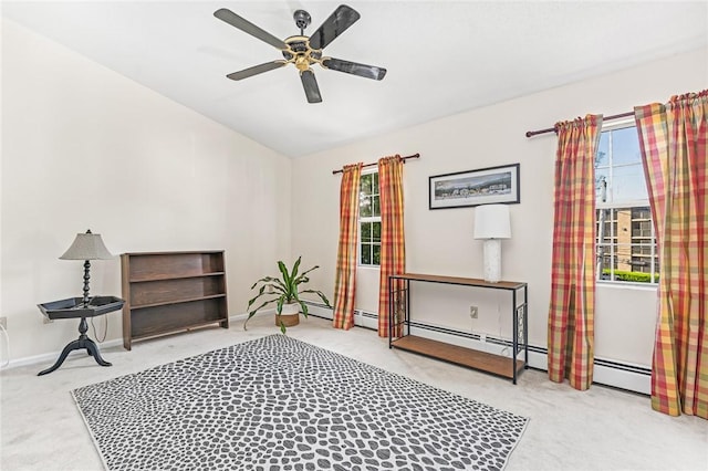 565 Quaker Ln Unit 43, West Warwick, RI 02893 - sitting room with carpet floors, vaulted ceiling, ceiling fan, and baseboards