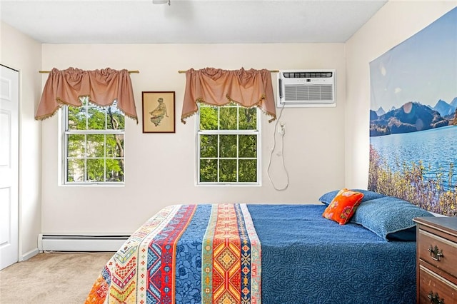 565 Quaker Ln Unit 43, West Warwick, RI 02893 - carpeted bedroom featuring baseboard heating and a wall mounted air conditioner