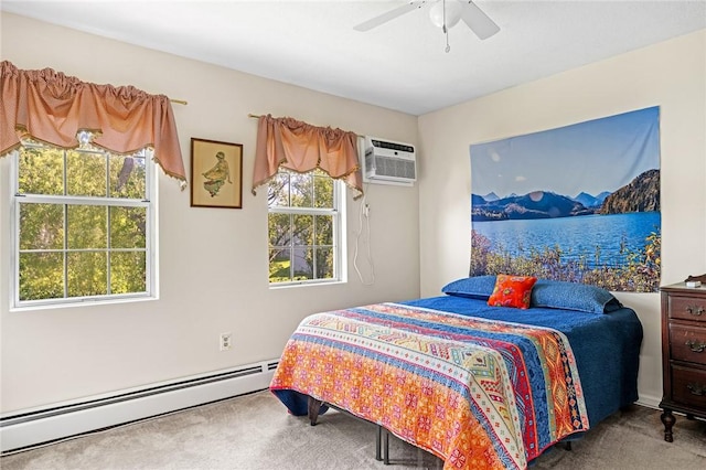 565 Quaker Ln Unit 43, West Warwick, RI 02893 - carpeted bedroom with a wall mounted air conditioner, a baseboard radiator, and ceiling fan