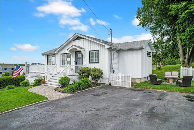 6 Dolphin Rd, Narragansett, RI 02882 - view of front of home featuring roof with shingles
