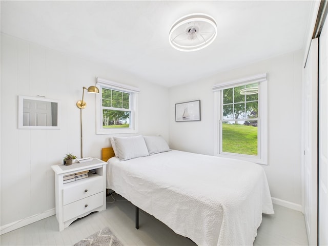 6 Dolphin Rd, Narragansett, RI 02882 - bedroom with multiple windows and baseboards