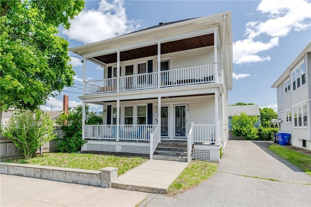 412 E Ave, Pawtucket, RI 02860 - view of front facade with covered porch, a balcony, and asphalt driveway