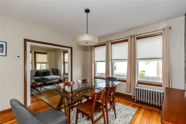 412 E Ave, Pawtucket, RI 02860 - dining room with radiator heating unit and light wood-style flooring