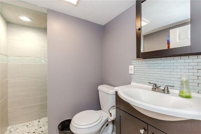 412 E Ave, Pawtucket, RI 02860 - full bath featuring a tile shower, vanity, toilet, decorative backsplash, and recessed lighting