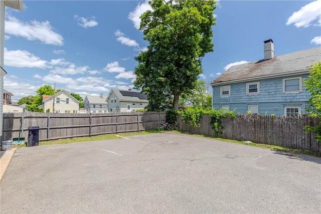 412 E Ave, Pawtucket, RI 02860 - uncovered parking lot featuring a residential view
