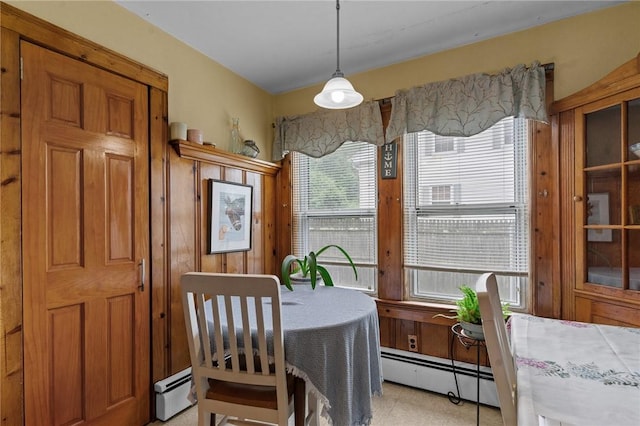 99 Third St, West Warwick, RI 02893 - dining area with a baseboard heating unit