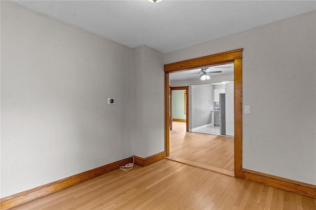 99 Third St, West Warwick, RI 02893 - empty room featuring baseboards, light wood-style floors, and ceiling fan