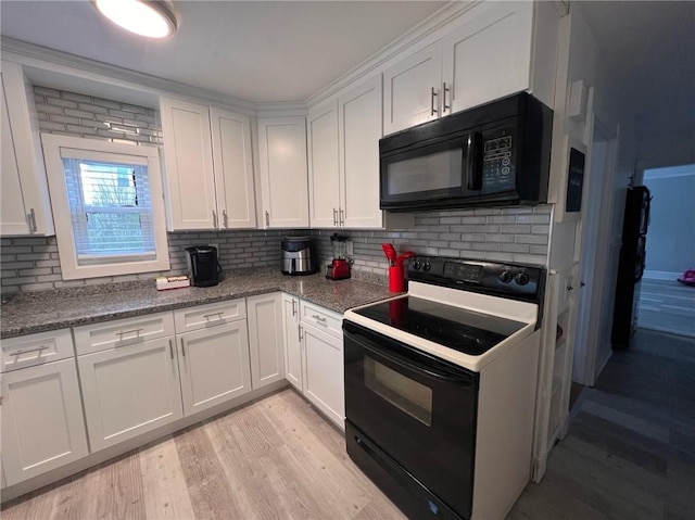 3506 Kingstown Rd, South Kingstown, RI 02892 - kitchen featuring black appliances, white cabinets, light wood-style floors, and decorative backsplash