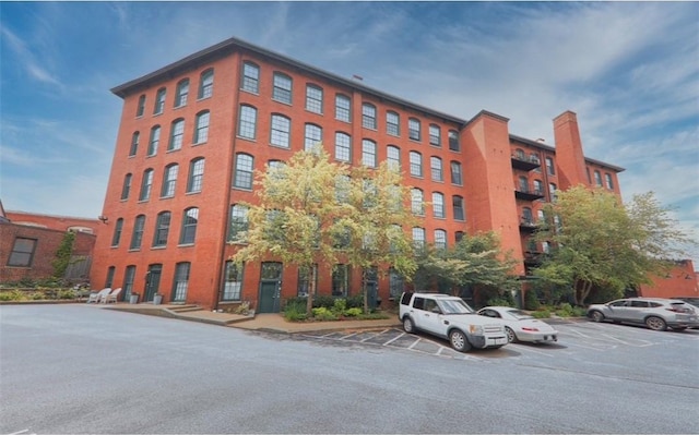 28 Bayley St N Unit 107, Pawtucket, RI 02860 - view of building exterior with uncovered parking