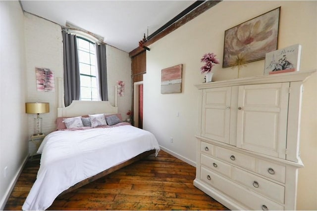 28 Bayley St N Unit 107, Pawtucket, RI 02860 - bedroom featuring dark wood-style flooring and baseboards