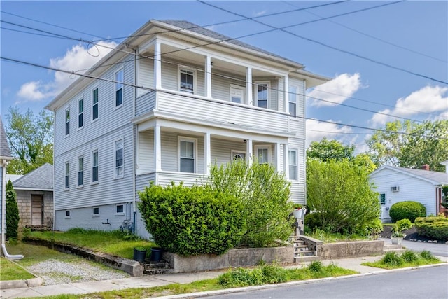 93 Naples Ave, Providence, RI 02908 - view of front of house featuring a balcony and covered porch