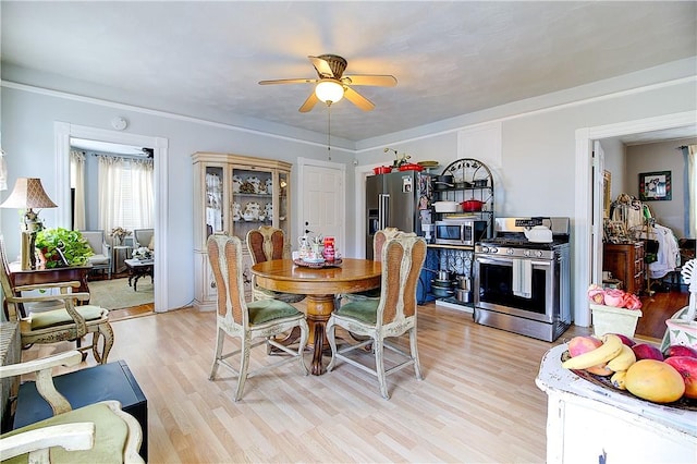 93 Naples Ave, Providence, RI 02908 - dining space with a ceiling fan and light wood finished floors
