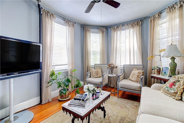 93 Naples Ave, Providence, RI 02908 - living area featuring ceiling fan, wood finished floors, and baseboards