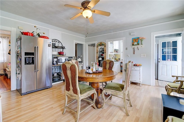 93 Naples Ave, Providence, RI 02908 - dining space featuring light wood-style floors and ceiling fan