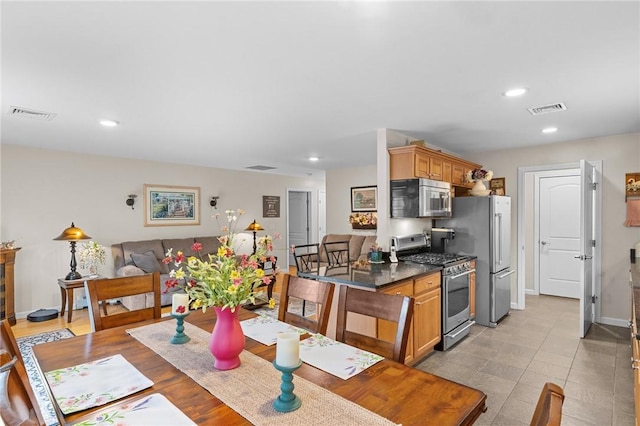 5 Leighas Ln, Coventry, RI 02816 - dining space with recessed lighting and baseboards