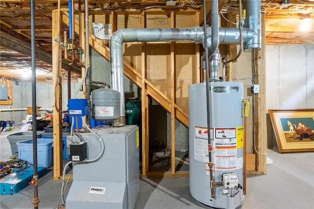 5 Leighas Ln, Coventry, RI 02816 - utility room featuring water heater and a heating unit