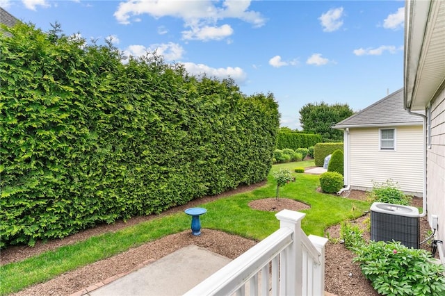 5 Leighas Ln, Coventry, RI 02816 - view of grassy yard featuring central AC