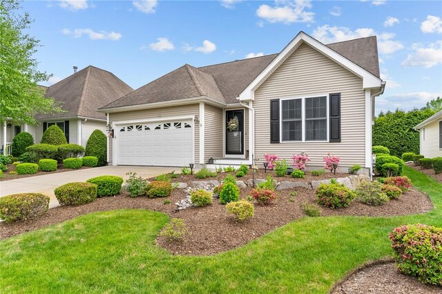 5 Leighas Ln, Coventry, RI 02816 - view of front of property featuring a garage, driveway, a front yard, and a shingled roof