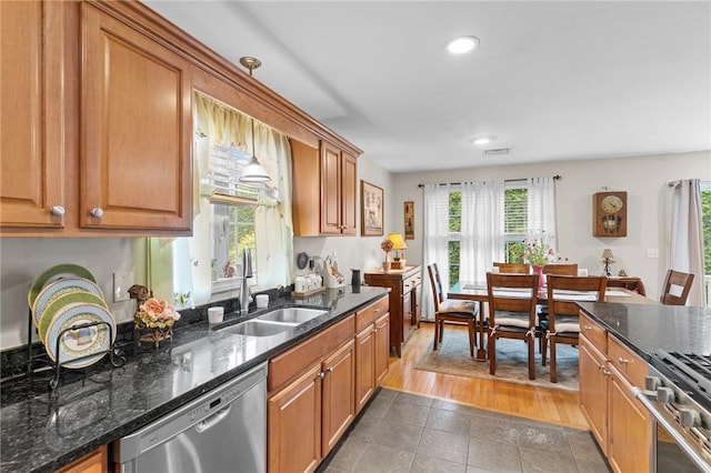 5 Leighas Ln, Coventry, RI 02816 - kitchen with appliances with stainless steel finishes, a sink, tile patterned floors, brown cabinets, and recessed lighting