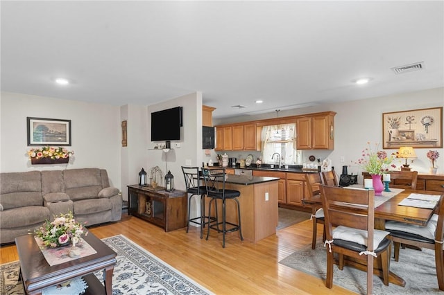 5 Leighas Ln, Coventry, RI 02816 - living area with light wood-style flooring and recessed lighting