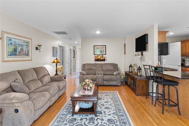 5 Leighas Ln, Coventry, RI 02816 - living room with light wood-style flooring and recessed lighting