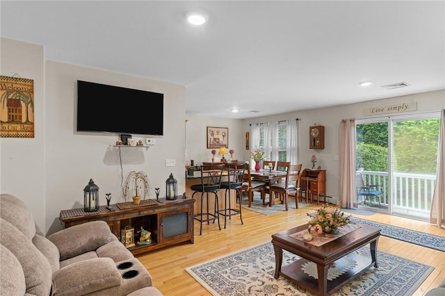 5 Leighas Ln, Coventry, RI 02816 - living area with light wood-style flooring and recessed lighting
