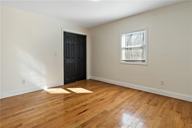 1300 Wallum Lake Rd, Burrillville, RI 02859 - empty room featuring baseboards and light wood finished floors