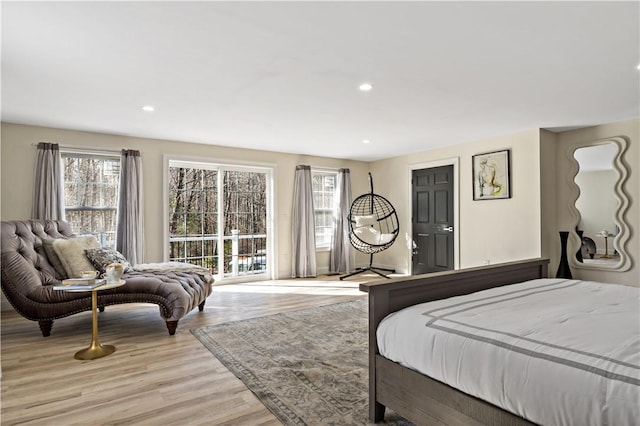 1300 Wallum Lake Rd, Burrillville, RI 02859 - bedroom featuring multiple windows, light wood finished floors, and recessed lighting