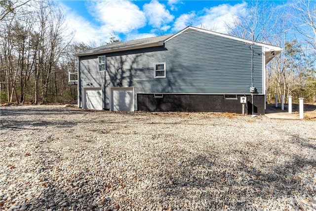 1300 Wallum Lake Rd, Burrillville, RI 02859 - view of home's exterior with a garage