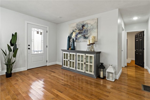 1300 Wallum Lake Rd, Burrillville, RI 02859 - entryway with baseboards, wood-type flooring, and recessed lighting