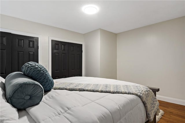 1300 Wallum Lake Rd, Burrillville, RI 02859 - bedroom featuring baseboards and wood finished floors