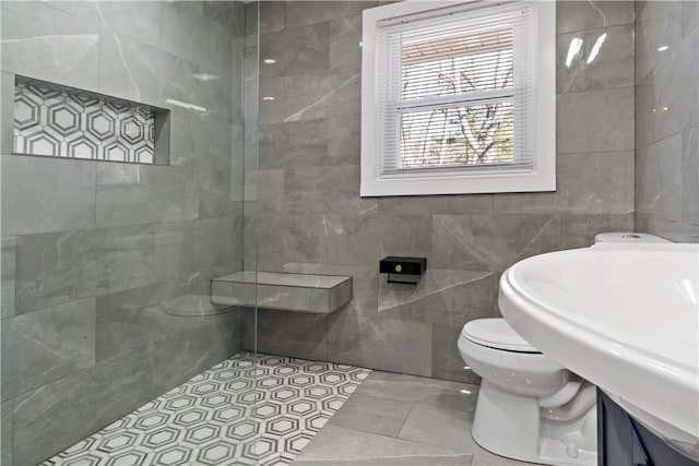 1300 Wallum Lake Rd, Burrillville, RI 02859 - bathroom with tile walls, toilet, tiled shower, and a sink