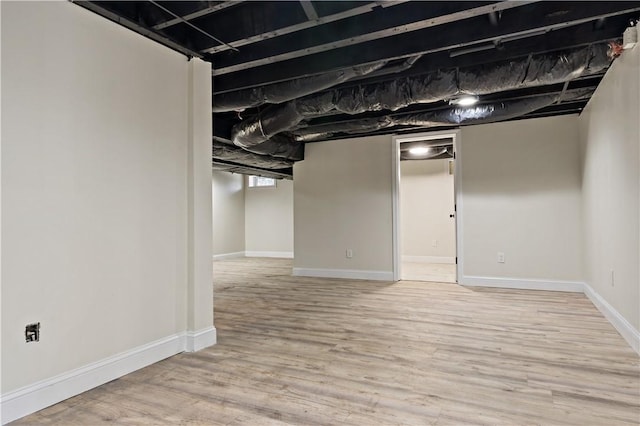 1300 Wallum Lake Rd, Burrillville, RI 02859 - finished below grade area with wood finished floors and baseboards