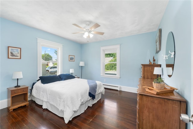 39 Camac St, Pawtucket, RI 02861 - bedroom featuring a baseboard radiator, dark wood-type flooring, baseboards, and ceiling fan
