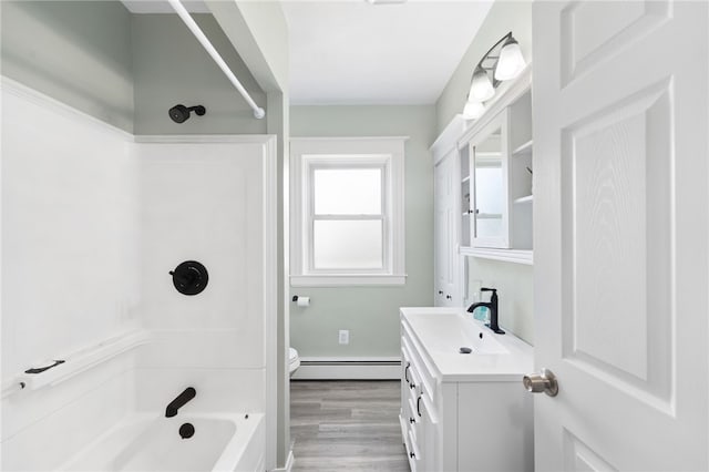 39 Camac St, Pawtucket, RI 02861 - full bathroom featuring baseboard heating, shower / bath combination, toilet, vanity, and wood finished floors