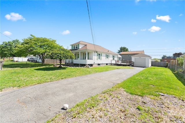 39 Camac St, Pawtucket, RI 02861 - view of front of property featuring an outbuilding, asphalt driveway, and a detached garage