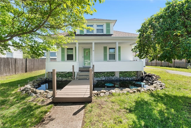 39 Camac St, Pawtucket, RI 02861 - bungalow featuring a porch and roof with shingles