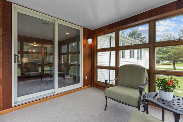 15 Womantam Ln, Cumberland, RI 02864 - sunroom with plenty of natural light and carpet
