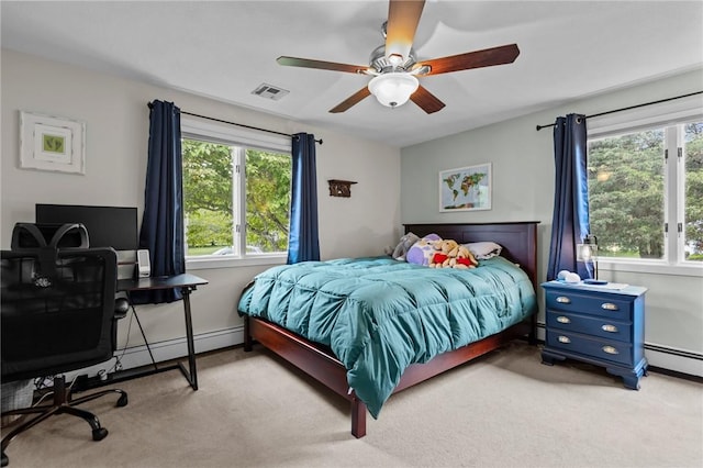 15 Womantam Ln, Cumberland, RI 02864 - carpeted bedroom featuring a ceiling fan, an office area, and a baseboard heating unit