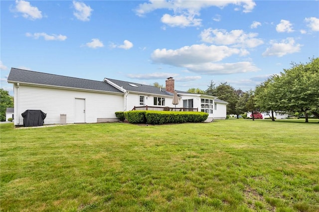 15 Womantam Ln, Cumberland, RI 02864 - rear view of property featuring a deck and a yard