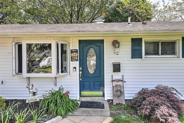 92 Chatworth Ave, Warwick, RI 02886 - property entrance featuring roof with shingles