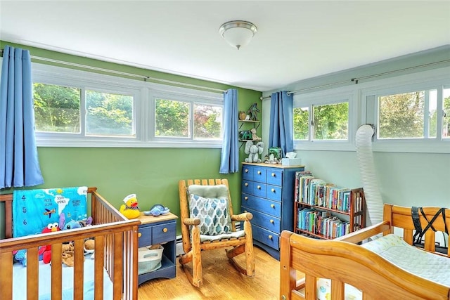 92 Chatworth Ave, Warwick, RI 02886 - bedroom featuring wood finished floors